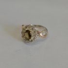 Срібна каблучка з золотими вставками