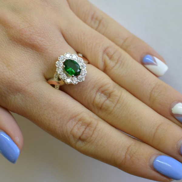 Срібна каблучка з золотими вставками