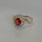 Срібна каблучка з золотими вставками