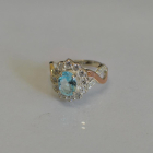 Срібна каблучка з золотими вставками