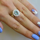 Срібна каблучка з золотими вставками