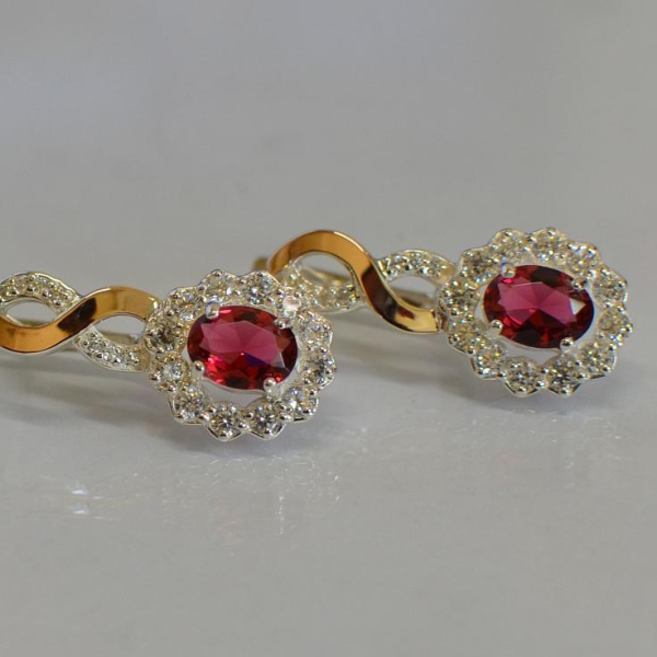 Срібні сережки з золотими напайками