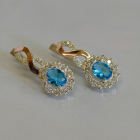 Срібні сережки з золотими напайками