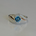 Срібна каблучка з золотими пластинами