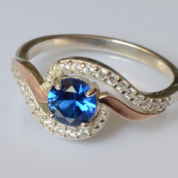 Срібна каблучка з золотими пластинами