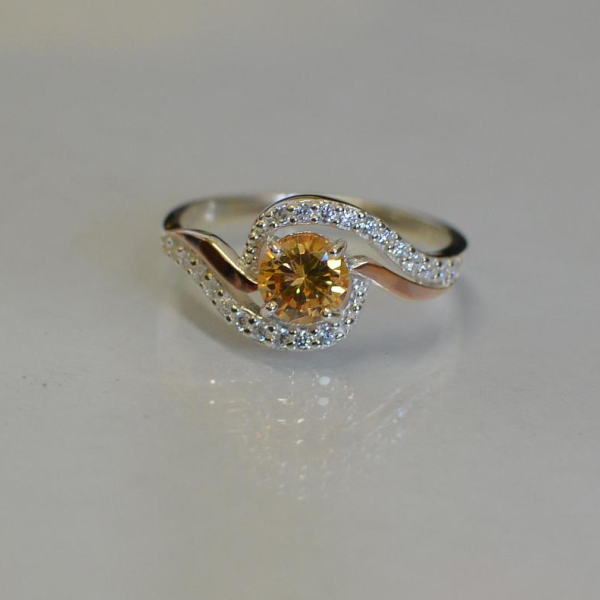 Срібна каблучка з золотими пластинами