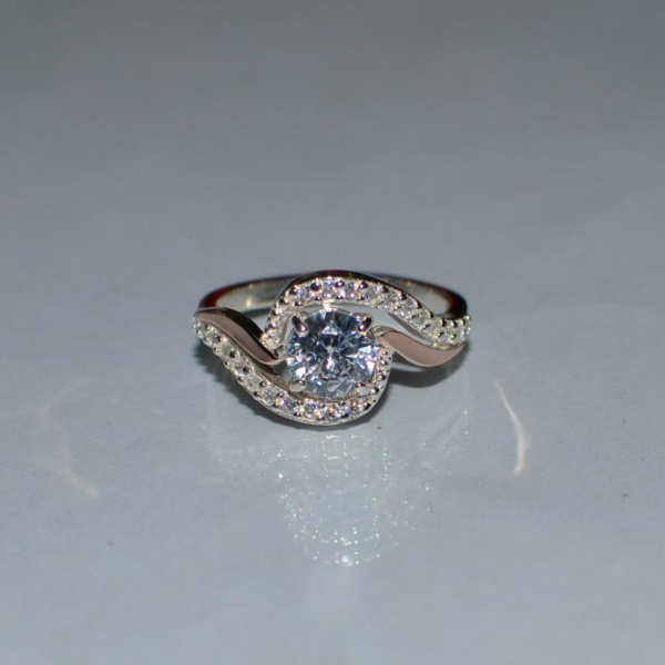 Срібна каблучка з золотими пластинами