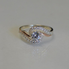 Срібна каблучка з золотими пластинами