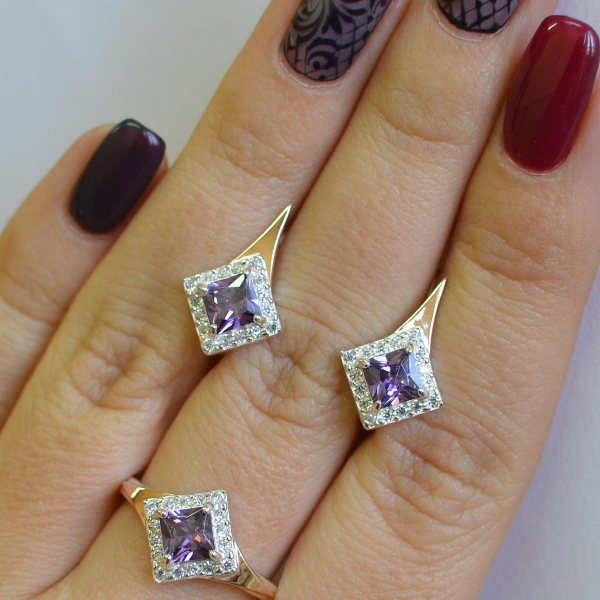 Срібний комплект з золотими вставками