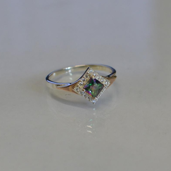 Срібна каблучка з накладками з золота