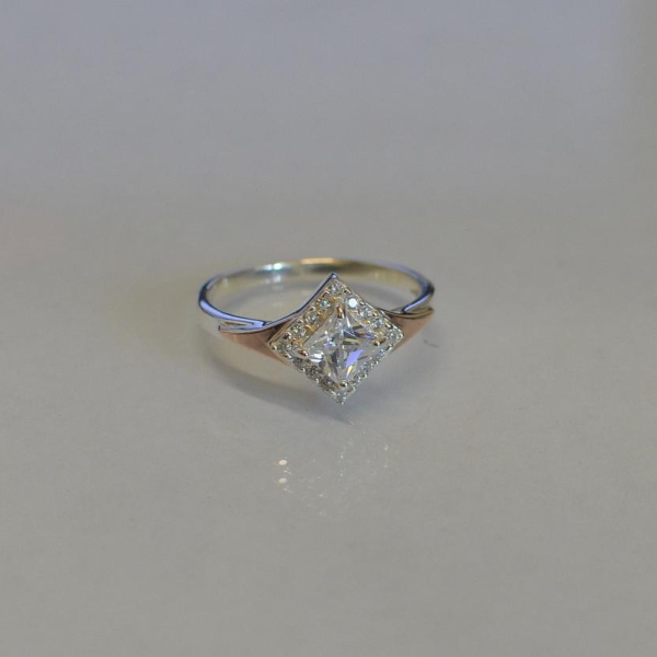 Срібна каблучка з накладками з золота