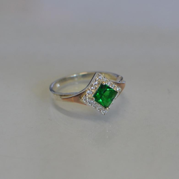 Срібна каблучка з накладками з золота