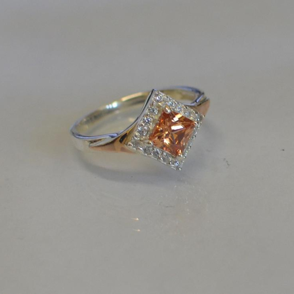 Срібна каблучка з накладками з золота