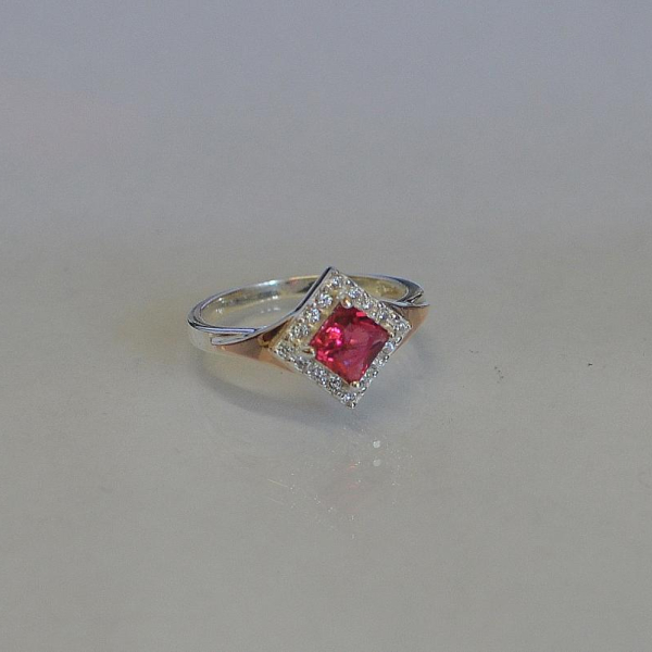 Срібна каблучка з накладками з золота