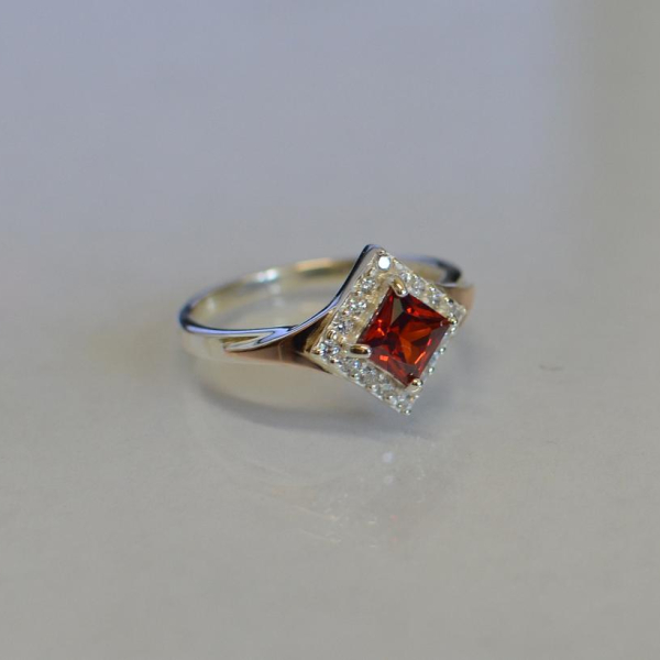 Срібна каблучка з накладками з золота