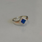 Срібна каблучка з накладками з золота