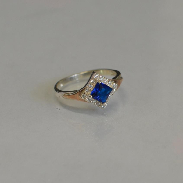 Срібна каблучка з накладками з золота