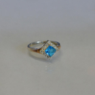 Срібна каблучка з накладками з золота