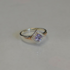 Срібна каблучка з накладками з золота