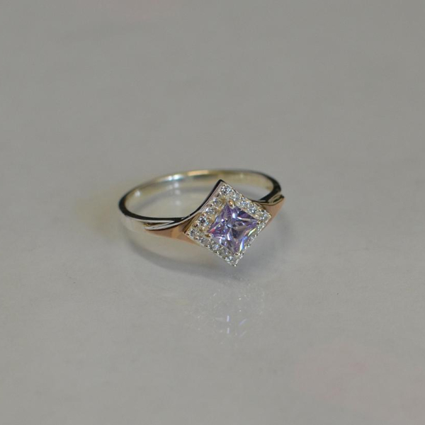 Срібна каблучка з накладками з золота