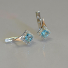 Срібні сережки з золотими напайками