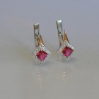 Срібні сережки з золотими напайками