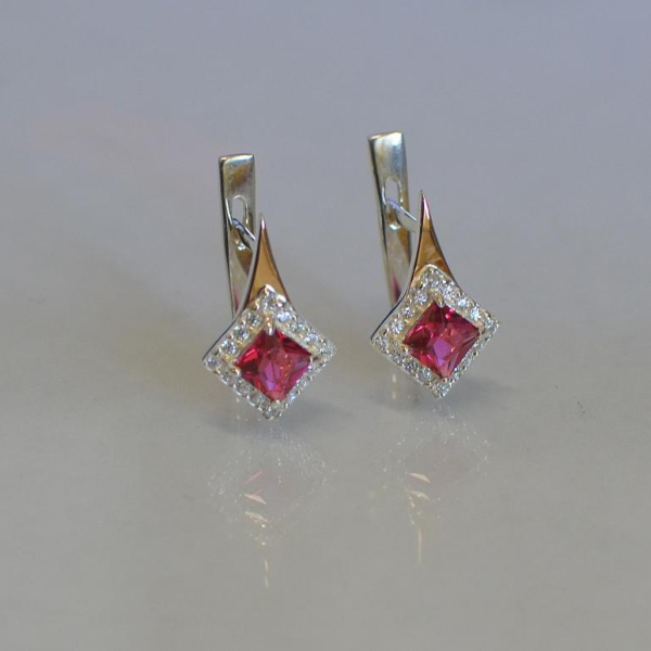 Срібні сережки з золотими напайками