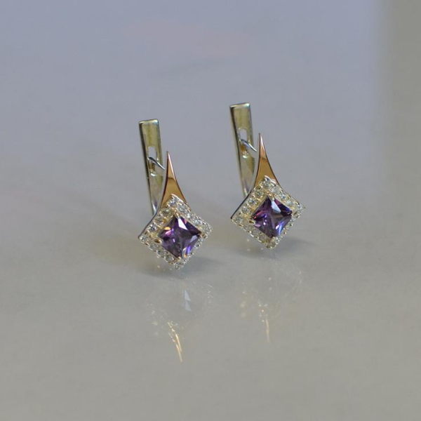 Срібні сережки з золотими напайками