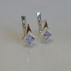 Срібні сережки з золотими напайками