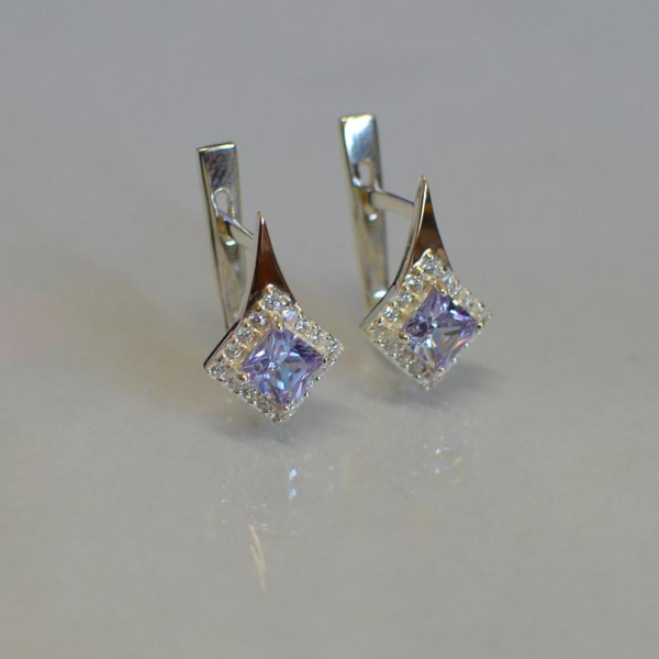 Срібні сережки з золотими напайками