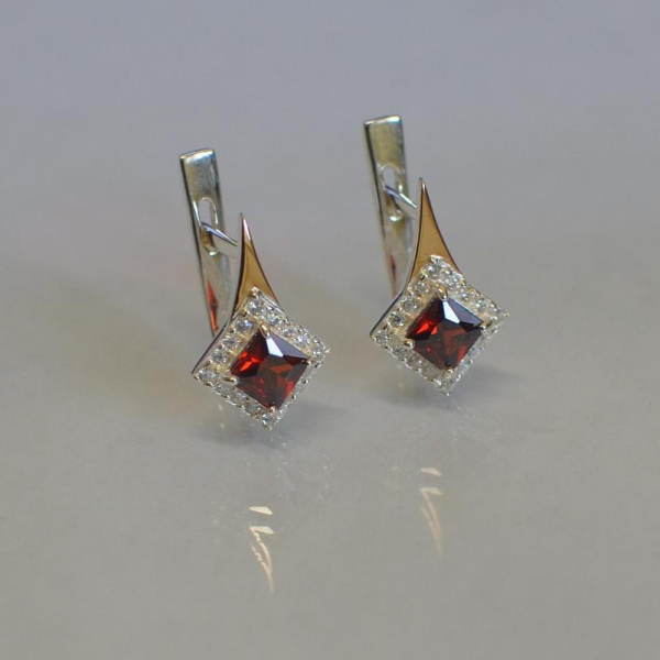 Срібні сережки з золотими напайками