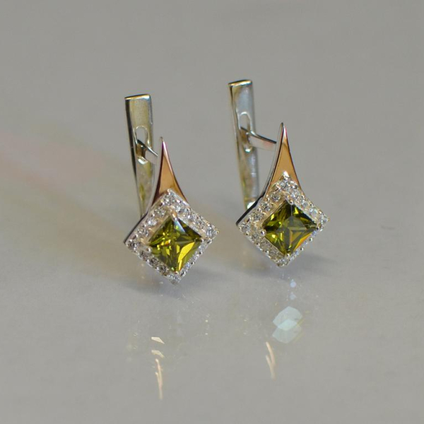 Срібні сережки з золотими напайками