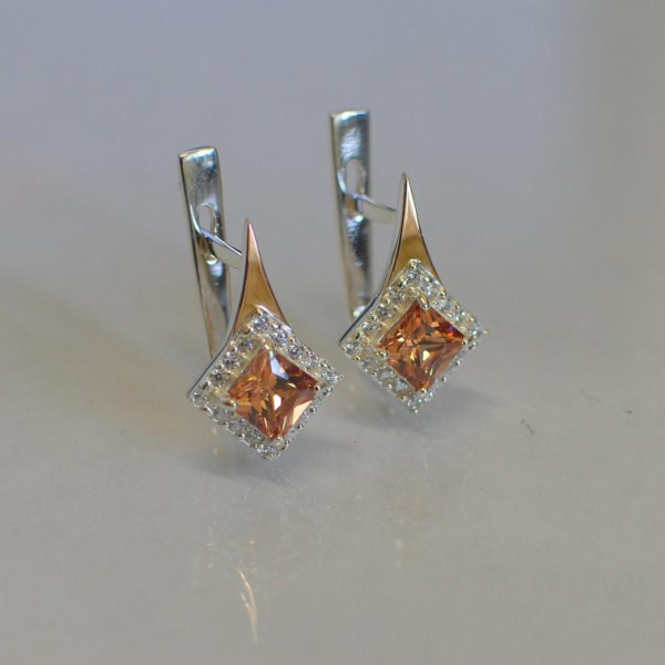 Срібні сережки з золотими напайками