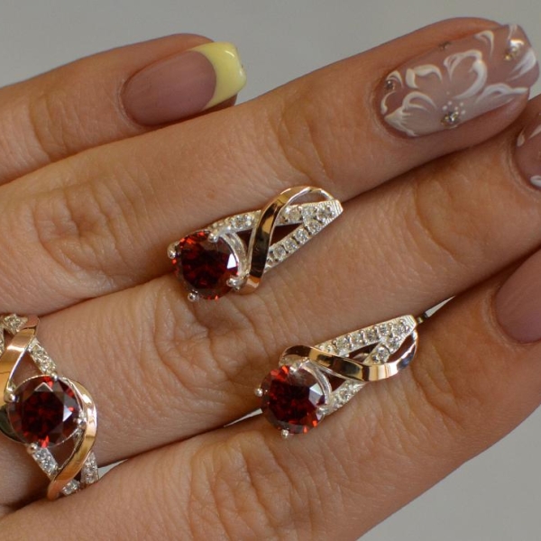 Срібний комплект прикрас з золотими вставкми