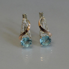 Кульчики із срібла та золота