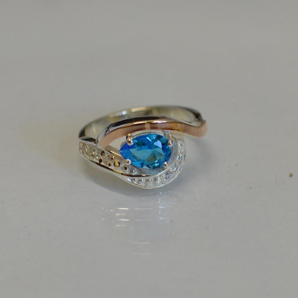 Срібна каблучка з елементами золота