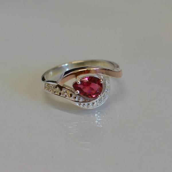 Срібна каблучка з елементами золота