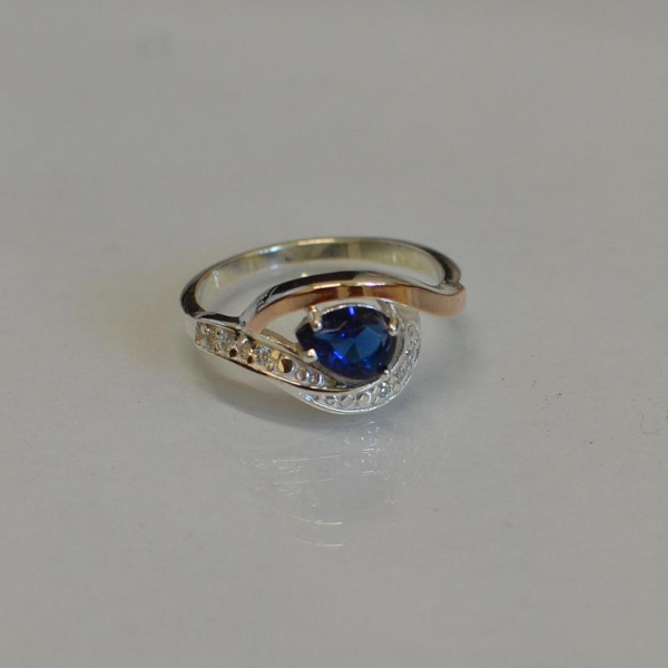 Срібна каблучка з елементами золота