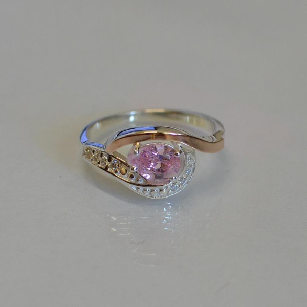 Срібна каблучка з елементами золота