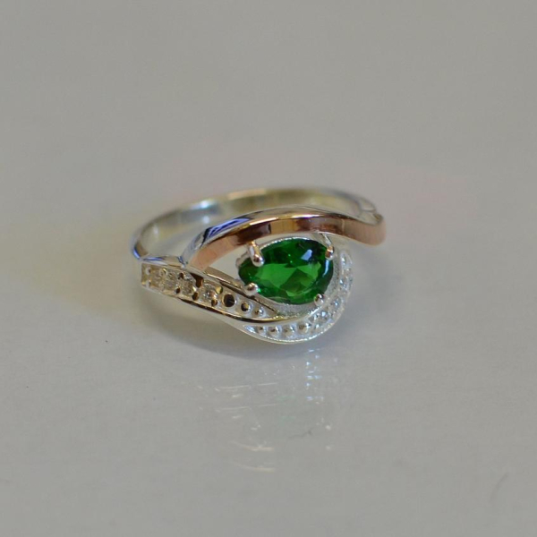 Срібна каблучка з елементами золота