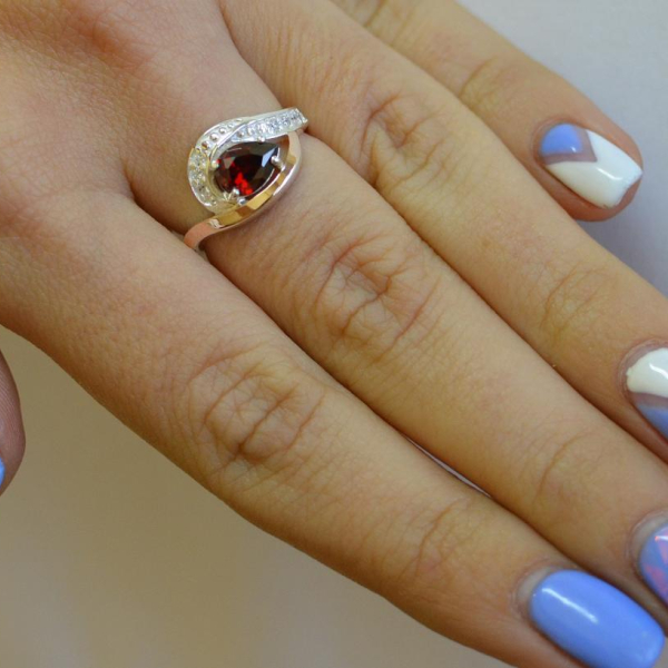 Срібна каблучка з елементами золота