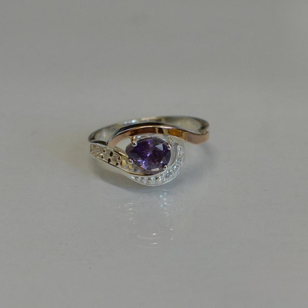 Срібна каблучка з елементами золота