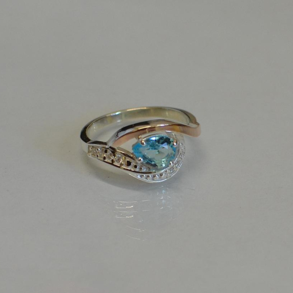 Срібна каблучка з елементами золота