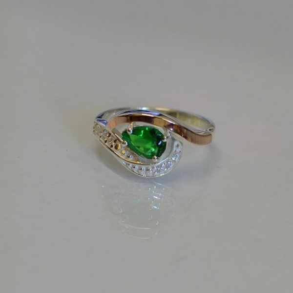 Срібна каблучка з елементами золота