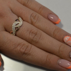 Срібна каблучка з золотими напайками і фіанітами