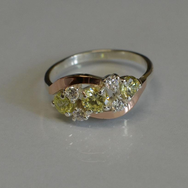 Каблучка срібна з золотими вставками (пластинами)