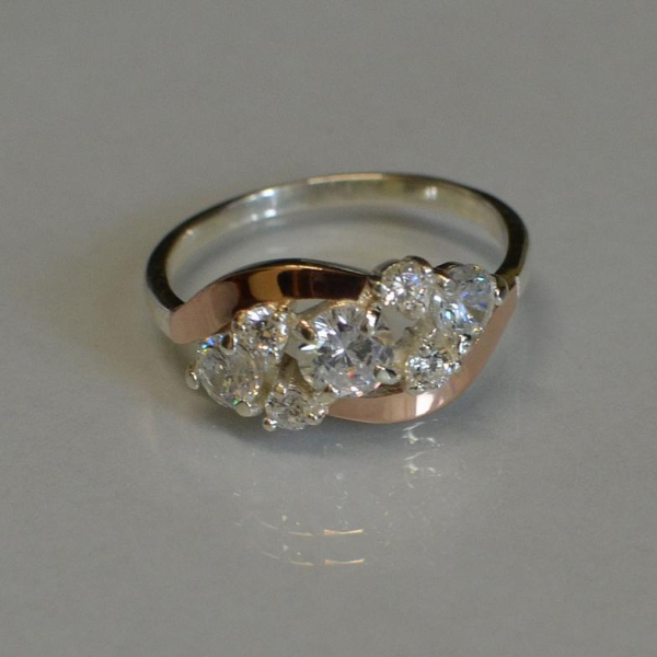 Каблучка срібна з золотими вставками (пластинами)