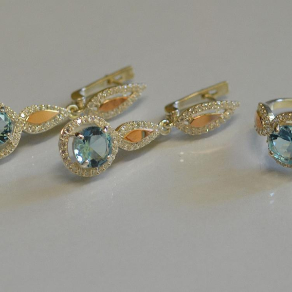 Серебряный комплект с золотыми пластинками