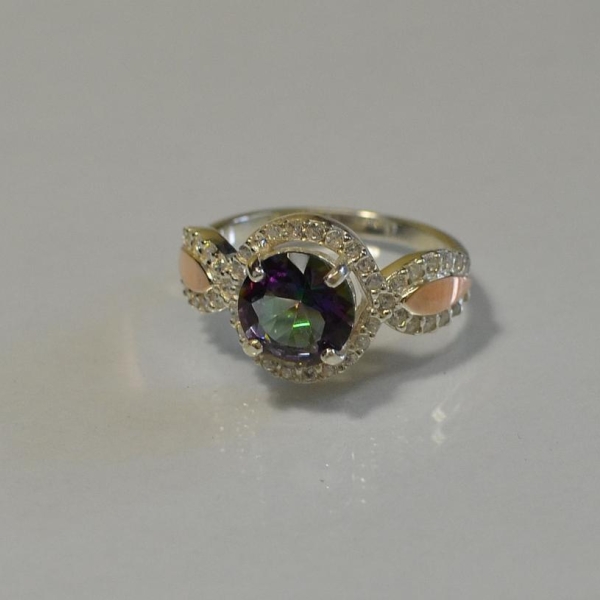 Серебряное кольцо с золотыми пластинками