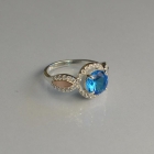 Серебряное кольцо с золотыми пластинками